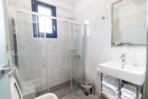 Family Suite, Balcony | Bathroom | Free toiletries, hair dryer, slippers, towels