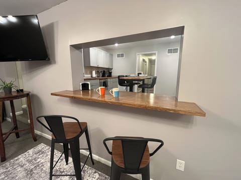 Living room pass-through into kitchen