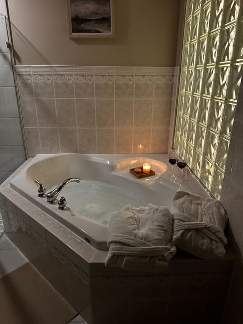 Enjoy a relaxing candlelit bath with comfy robes for your Five Gables experience