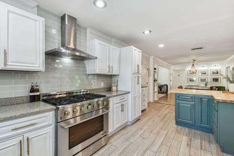 Luxury kitchen with gas oven & stove.