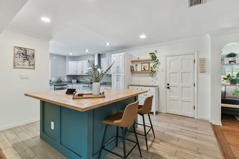 Fully stocked kitchen with ample counter space.