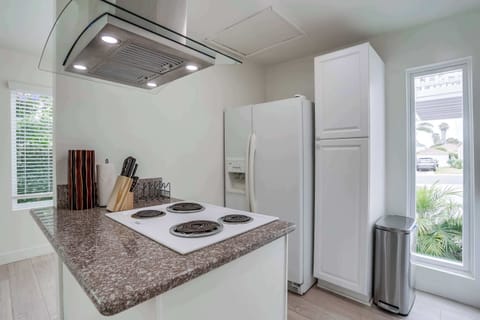 Kitchen with pantry and refrigerator