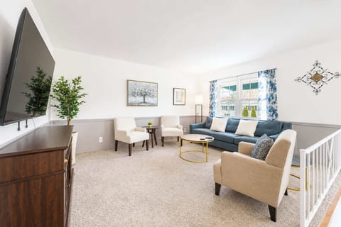 Curl up in the tranquil living room & stream your favorites on the smart TV