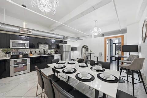 Spacious dining area set for group meals and gatherings.