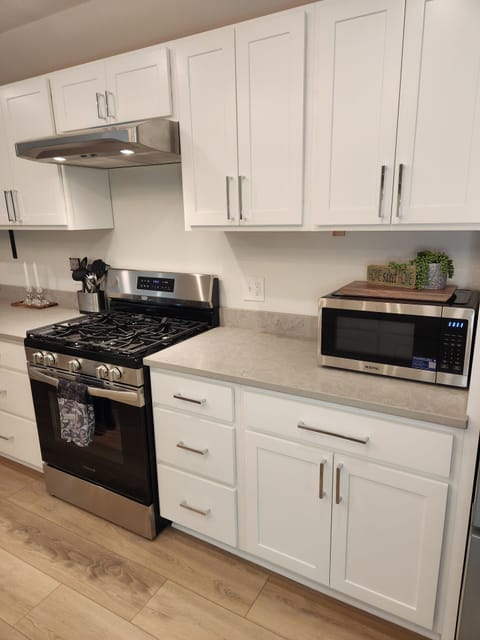 Fully stocked kitchen cabinets with everything you'll need for your stay! 