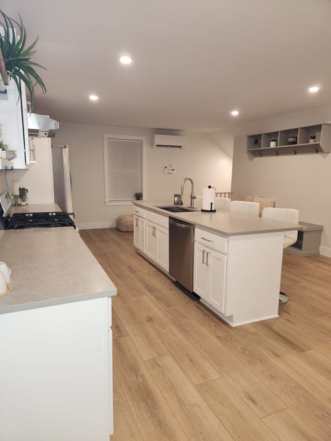 Brand new stainless steel dishwasher, nine foot center island, Kohler fixtures