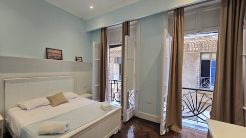 Desk, laptop workspace, free WiFi, bed sheets