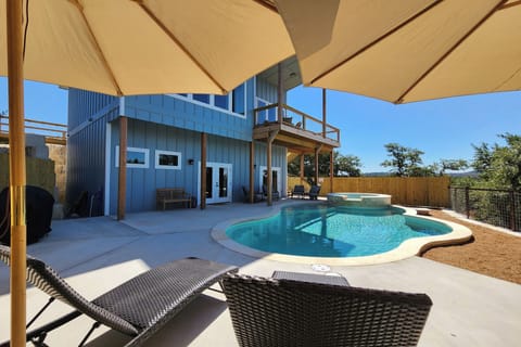 Shaded lounge chairs poolside