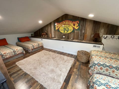 Loft has 4 twins that can be pushed together to create 2 king beds if desired