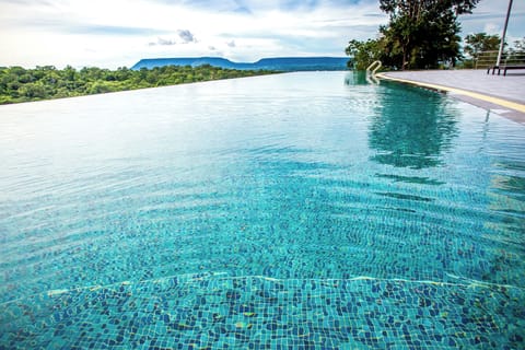 Outdoor pool, open 7:00 AM to 8:00 PM, sun loungers