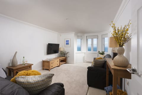 Living room with Smart TV and sea view - Bay View, Compass Point