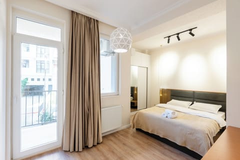 Deluxe Apartment, Balcony, City View | 2 bedrooms, blackout drapes, iron/ironing board, free WiFi