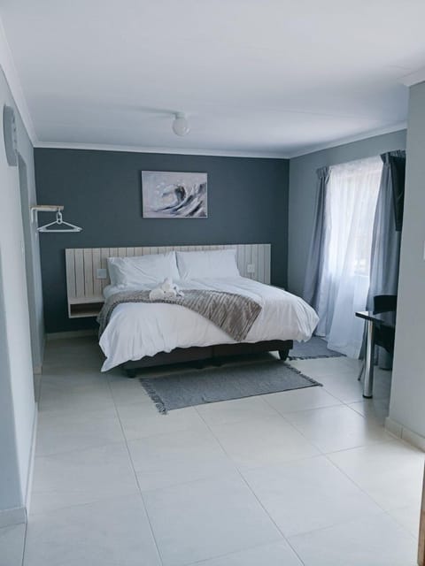 Comfort Room | Desk, laptop workspace, blackout drapes, iron/ironing board (on request)