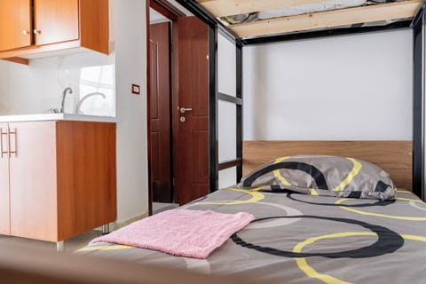 Bed in 7-Bed Dormitory Room | Free WiFi, bed sheets