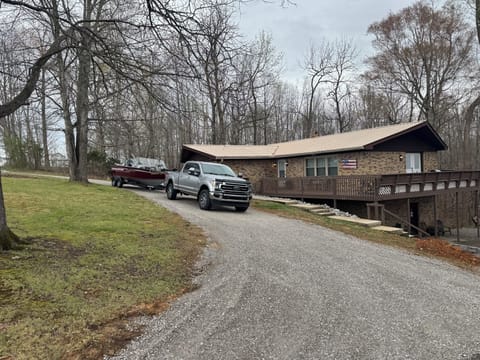 Convenient Pull through driveway with electric availabile for battery charging.