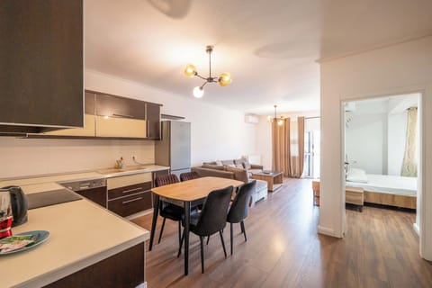 Apartment, 1 Bedroom | Living room | 42-inch flat-screen TV with satellite channels