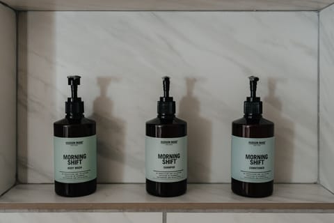 Thoughtfully Curated Luxury Toiletries – High-quality Hudson Made bath products ensure an indulgent experience, offering natural and refreshing scents to elevate your stay.