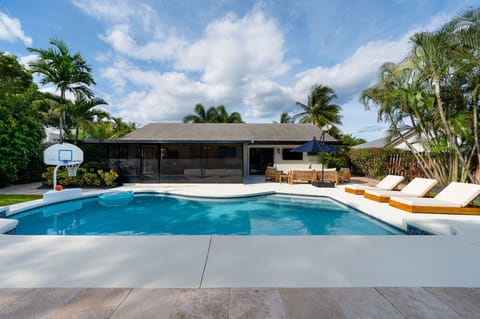 Spacious pool and deck area—perfect for lounging, sunbathing, and soaking up the Florida sunshine.