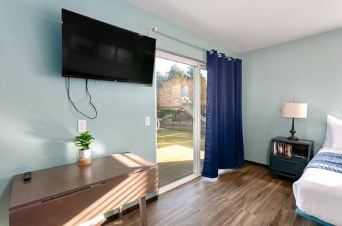 Cozy bedroom with patio access near beach trails and pickleball courts