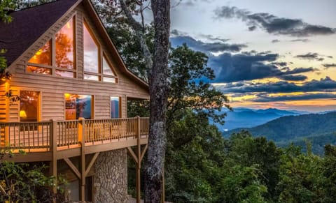 Evening mountain views light up this private cabin rental near Bryson City, perfect for a peaceful Smoky Mountain getaway