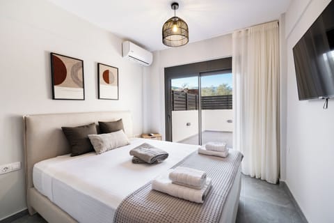 Deluxe Apartment, 1 Bedroom, Poolside | In-room safe, blackout drapes, soundproofing, iron/ironing board