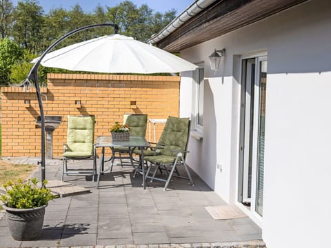 Furniture, Umbrella, Outdoor Furniture, Chair, Outdoor Table, Shade, Flowerpot, Patio, Garden, Houseplant