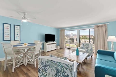 Sunlight fills the living room, creating the perfect place to relax.