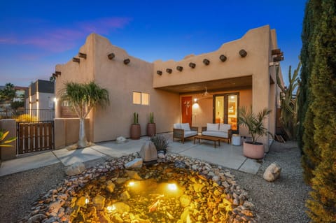 [Courtyard] Santa Fe Spanish Pueblo home with Koi Pond