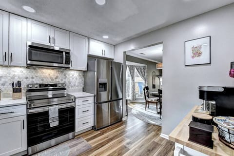 Full size appliance in fully stocked kitchen