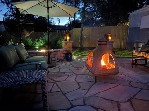 Evening on the Stone patio with the aroma of the cheminea burning. 