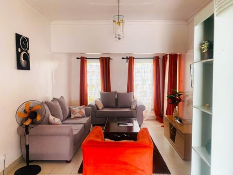Family Villa, Garden View | Living area | 24-inch Smart TV with digital channels