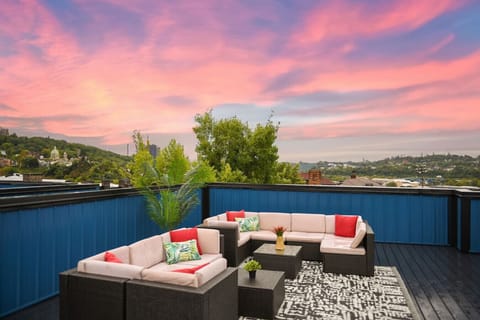 Unwind on the rooftop deck with skyline views and unforgettable sunset vibes.