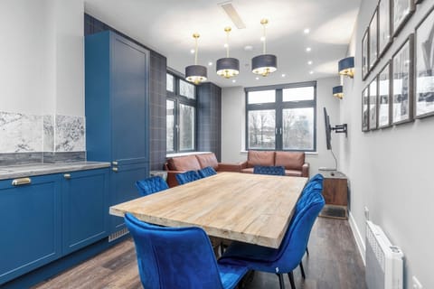 Open plan kitchen and living room with TV area