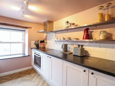 Fridge, electric kettle, toaster, cookware/dishes/utensils