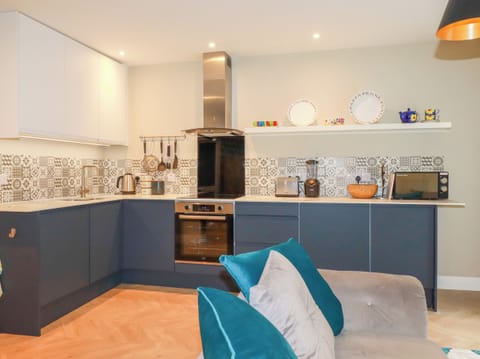 Fridge, dishwasher, electric kettle, cookware/dishes/utensils