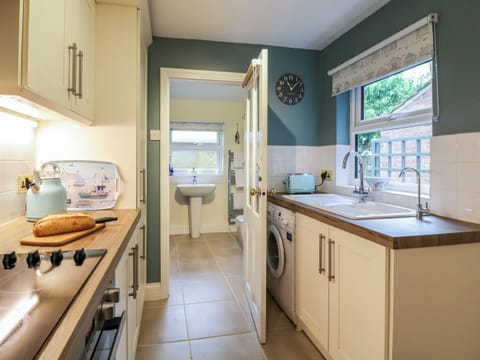 Fridge, electric kettle, toaster, cookware/dishes/utensils