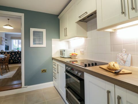 Fridge, electric kettle, toaster, cookware/dishes/utensils