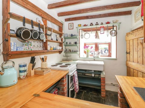 Fridge, electric kettle, toaster, cookware/dishes/utensils