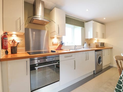 Fridge, electric kettle, toaster, cookware/dishes/utensils