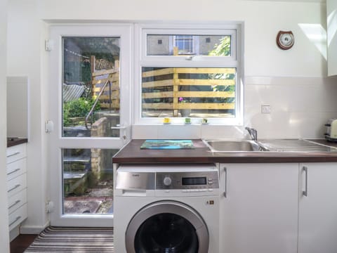 Fridge, electric kettle, toaster, cookware/dishes/utensils