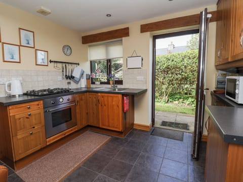 Fridge, electric kettle, toaster, cookware/dishes/utensils