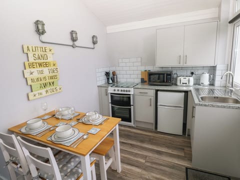 Fridge, electric kettle, toaster, cookware/dishes/utensils