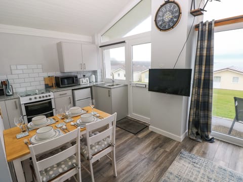 Fridge, electric kettle, toaster, cookware/dishes/utensils