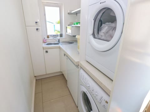 Fridge, dishwasher, electric kettle, cookware/dishes/utensils