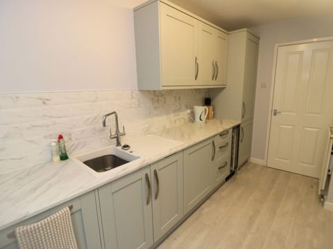 Fridge, dishwasher, electric kettle, cookware/dishes/utensils