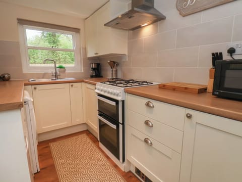 Fridge, electric kettle, toaster, cookware/dishes/utensils