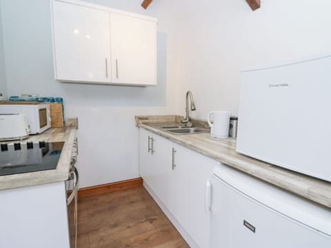 Fridge, electric kettle, toaster, cookware/dishes/utensils