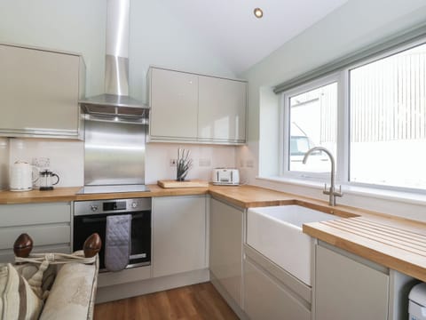 Fridge, electric kettle, toaster, cookware/dishes/utensils