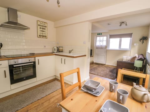 Fridge, electric kettle, toaster, cookware/dishes/utensils