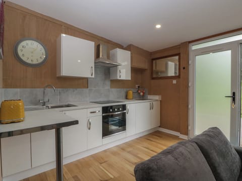 Fridge, electric kettle, toaster, cookware/dishes/utensils